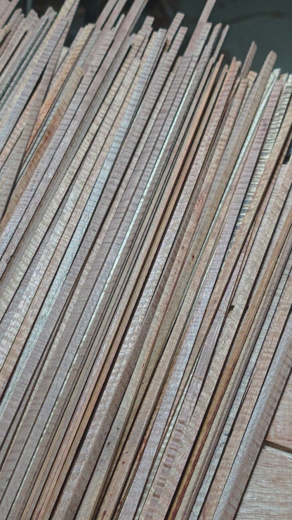 Curly padauk wood guitar binding