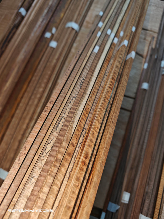 Curly padauk wood guitar binding