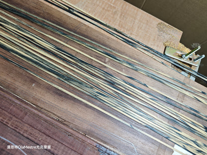 Black and white ebony wood guitar binding