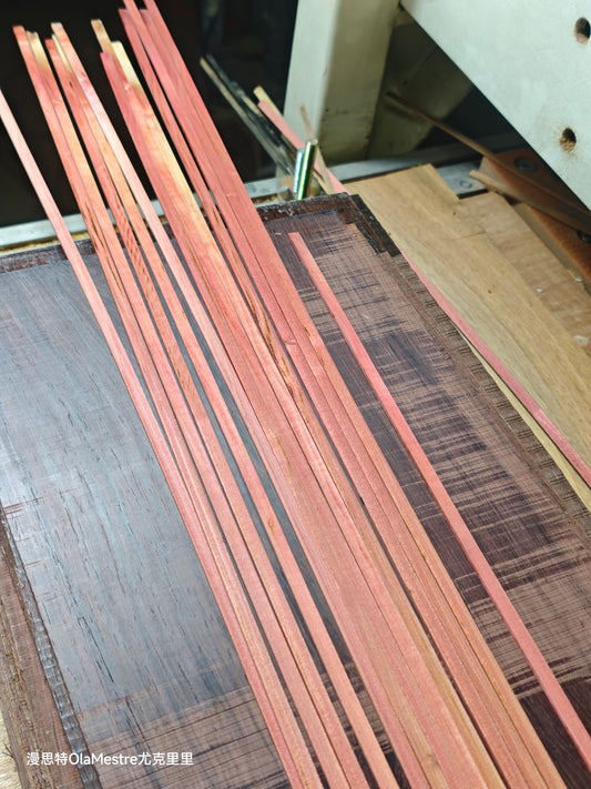 Pink Ivory wood guitar binding