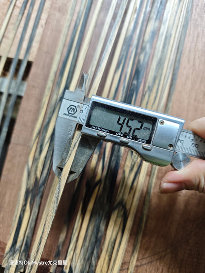 Black and white ebony wood guitar binding