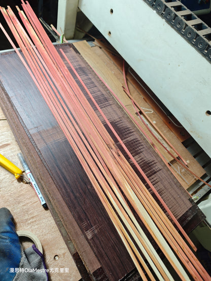 Pink Ivory wood guitar binding